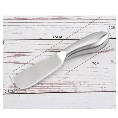 Lame incurvée en acier inox pour beurrer sans déchirer le pain
