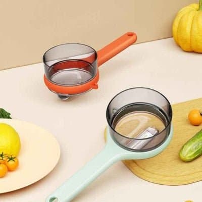 Éplucheur à légumes EcoPeel™ système drainage intégré rinçage sans manipulation - Cuisinezchezvous.com