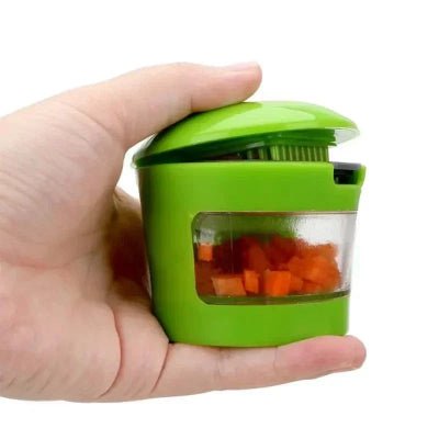 Presse ail robuste pour ail ,carottes ,polyvalent en action ans la dcuisine - Cuisinezchezvous.com